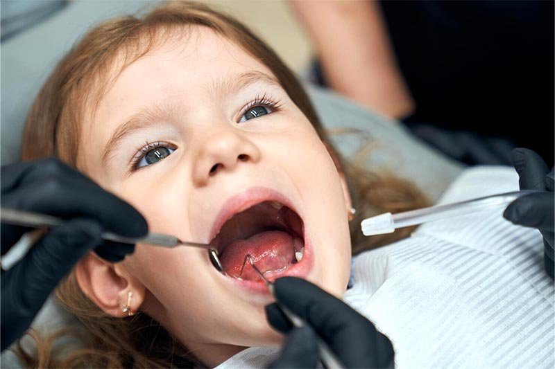 idade ideal para lavar o filho ao dentista